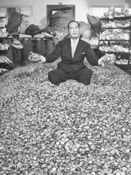 Walter Mack sitting on Pepsi bottlecaps